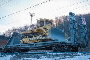 Railway transportation of bulldozers. photo