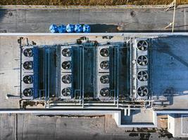 Aerial top down view of air conditioning system on the roof. photo