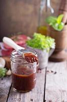 Barbeque sauce in a jar photo