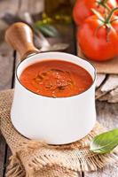 Freshly made tomato soup in a saucepan photo