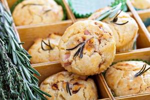 Savory muffins with herbs, tomatoes and ham photo