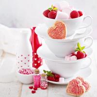 Valentines day sugar cookies in stacked cups photo