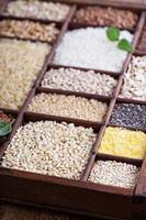 Variety of healthy grains and seeds photo