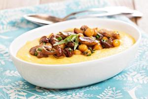 Polenta with spicy muchrooms and chickpeas photo