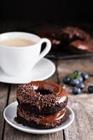 Chocolate donuts with coffee and blueberries photo