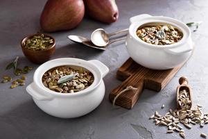 Baked oatmeal with pears and seeds photo
