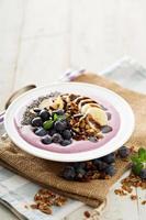 Blueberry smoothie bowl with banana and chia seeds photo