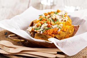 Baked stuffed sweet potato with rice photo