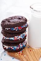 Chocolate sandwich cookies with creamy filling photo