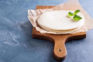 Wheat flour tortillas on a parchment photo