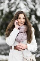 Young woman at winter time photo