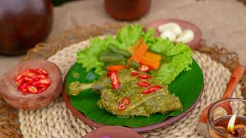 duck food with green chili complete with spices photo