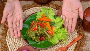 duck food with green chili complete with spices photo