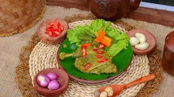 duck food with green chili complete with spices photo