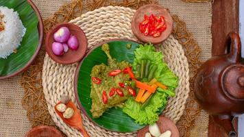 duck food with green chili complete with spices photo