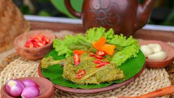 duck food with green chili complete with spices photo