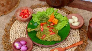 duck food with green chili complete with spices photo