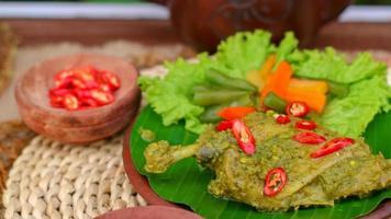 duck food with green chili complete with spices photo