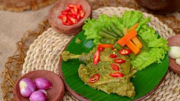 duck food with green chili complete with spices photo