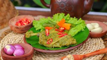 duck food with green chili complete with spices photo