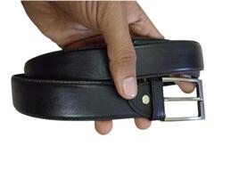 Stylish black leather belt isolated on white background photo