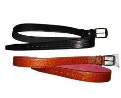 Stylish brown, black leather belt isolated on white background photo