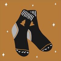 Christmas traditional warm socks in scandinavian hand drawn style in gold, silver, black colors. Vector illustration, one simple bright object, square format. Suitable for social media