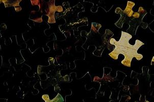 Puzzle pieces on the table photo