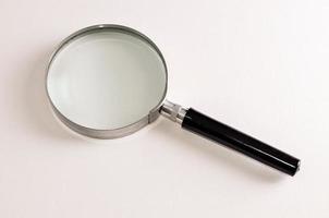 Isolated magnifier glass photo