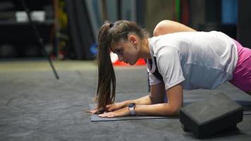 Woman stretching in gym video