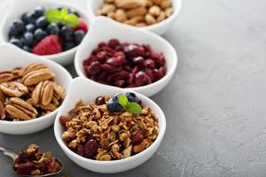 Variety of breakfast food in small bowls photo