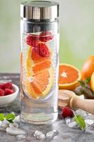 Infused detox water with raspberry photo