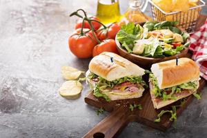 Italian sub sandwich with chips photo