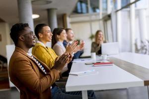 Group of business people working together and preparing new project on a meeting in office photo