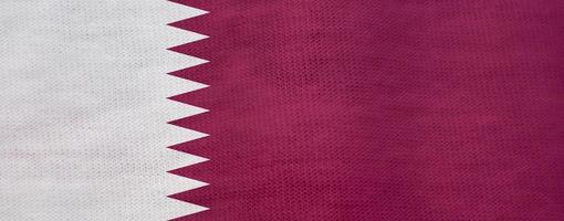 textura de la bandera de qatar como fondo foto