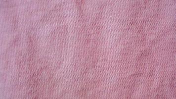 pink cloth texture as background photo