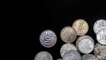 pile of rupiah coins as background photo