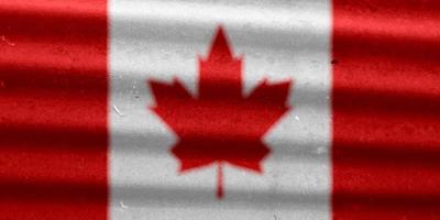 textura de la bandera canadiense como fondo foto