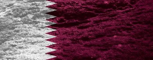 textura de la bandera de qatar como fondo foto