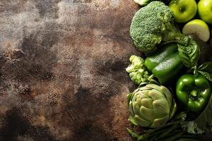 Variety of green vegetables and fruits photo