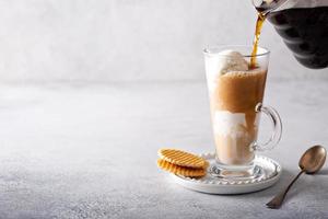 Affogato coffee in tall glass photo