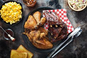 Grilled or smoked ribs and chicken photo