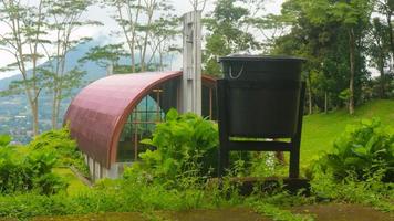 black trash can at tourist spot photo