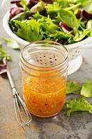 Italian vinaigrette dressing in a mason jar photo