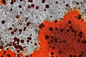 Detailed close up surface of rusty metal and steel with lots of corrosion in high resolution photo