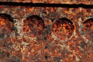 Detailed close up surface of rusty metal and steel with lots of corrosion in high resolution photo