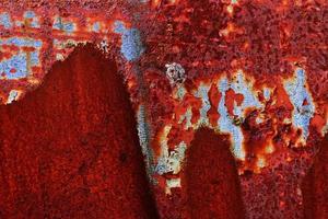 Detailed close up surface of rusty metal and steel with lots of corrosion in high resolution photo