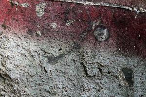 Detailed view on aged concrete walls with cracks and a lot of structure in high resolution photo