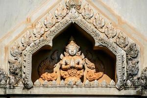 Buddhist sculptures in a temple in Bangkok, Thailand, circa May 2022 photo