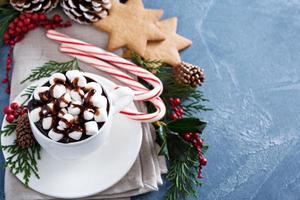 Christmas hot chocolate with festive decorations photo